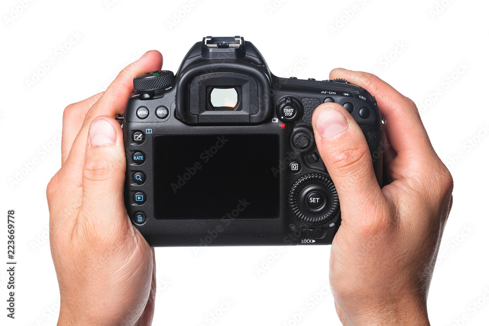 Photo camera in hand isolated on white background Photo camera in hand isolated on white background