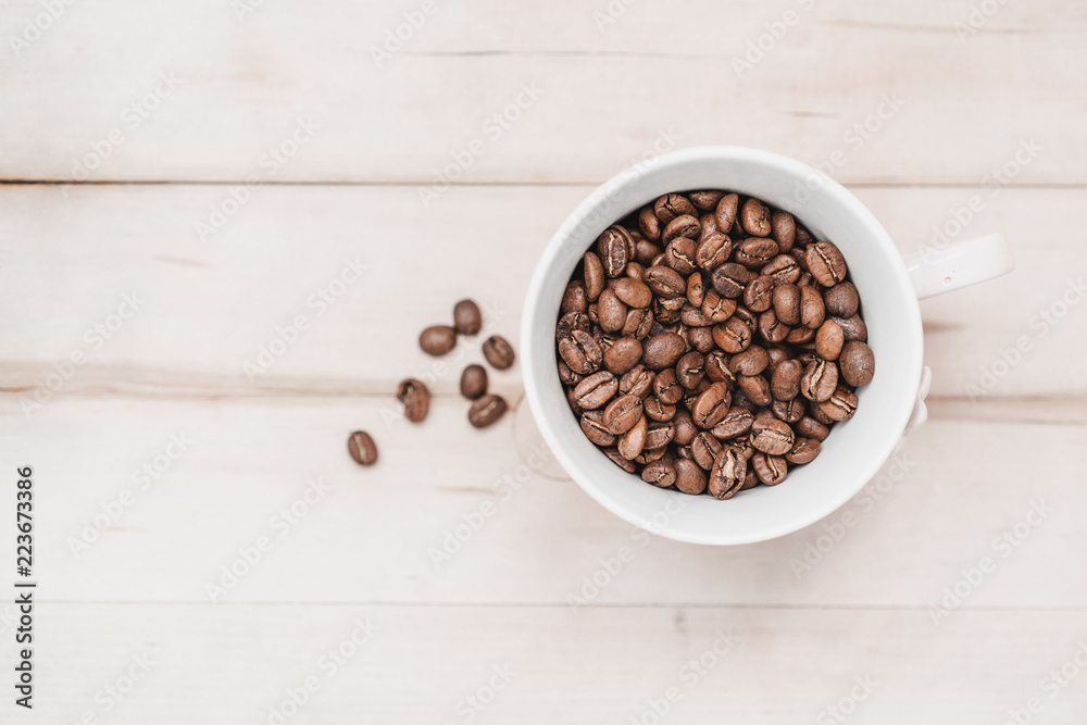 Close up of coffee beans in a cup Close up of coffee beans in a cup