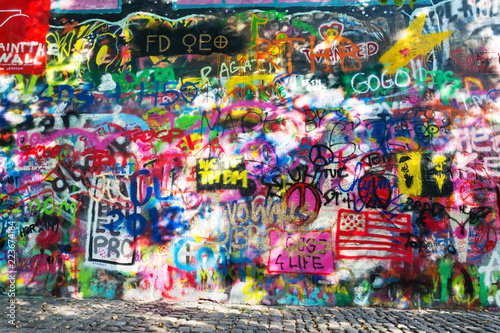 Famous John Lennon Wall covered with graffiti in the Little Town area near Charles Bridge, Mala Strana, Prague, Czech Republic