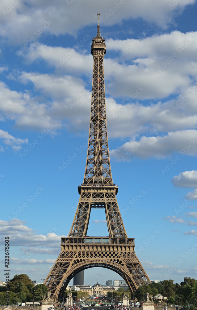 big Eiffel Tower with blue sky and clouds from the Trocadero in