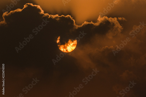 The Sun and clouds photo