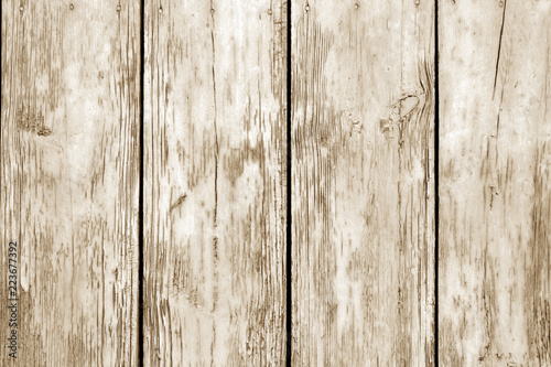 Old grunge wooden fence pattern in brown tone.
