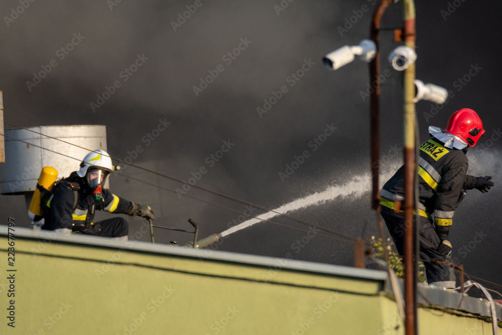 firefighters during the action of extinguishing a powerful fire of a recycling company.Poland, Szczecin