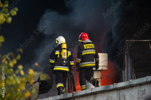 firefighters during the action of extinguishing a powerful fire of a recycling company.Poland, Szczecin