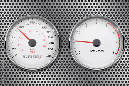 Speedometer and tachometer on metal perforated background