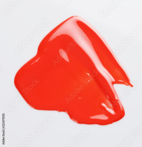 Texture of the Red Lipgloss liquid, white background