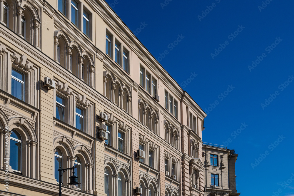 classical style buildings against a blue sky