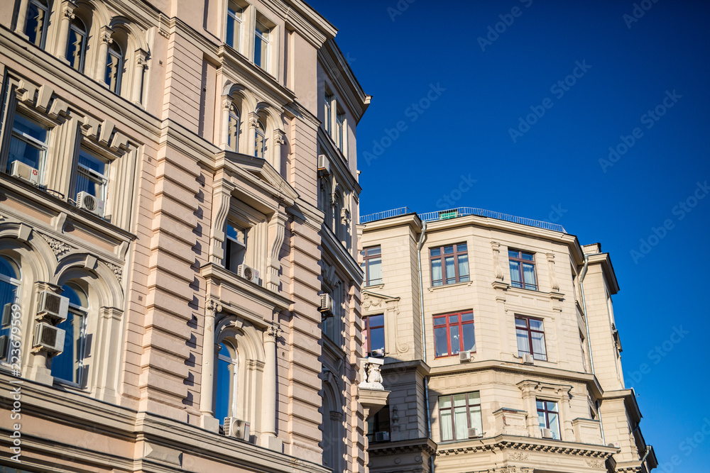 classical style buildings against a blue sky