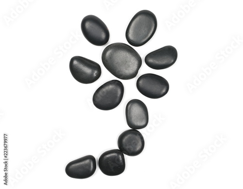 Black rock pile isolated on white background, top view