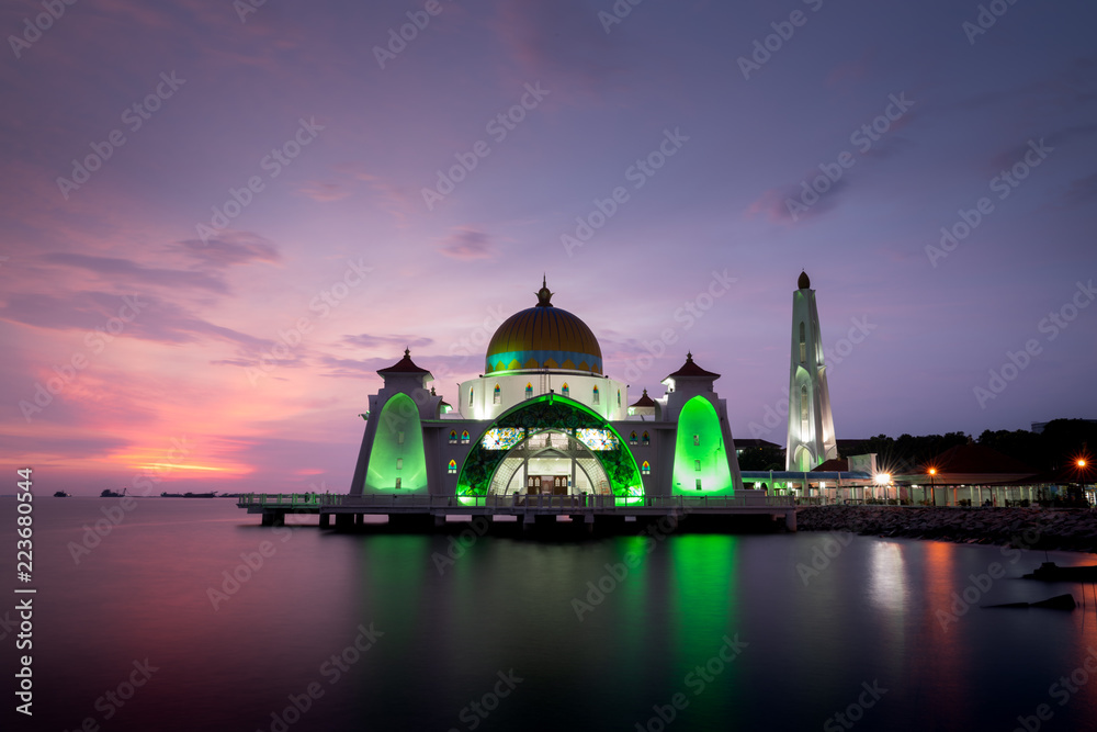 Sunset in Melaka Straits mosque by the sea 