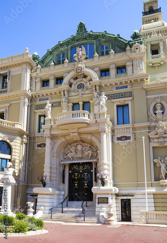 Monaco, entrance to the Opera house Monte Carlo. The Opera house in Monaco was designed by the architect Charles Garnier in the 1870s. The theatre is located on the Mediterranean coast. photo
