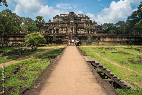 The Baphuon temple is a three-tiered temple mountain built as the state temple of Udayadityavarman II. Located in Angkor Thom, Cambodia. photo