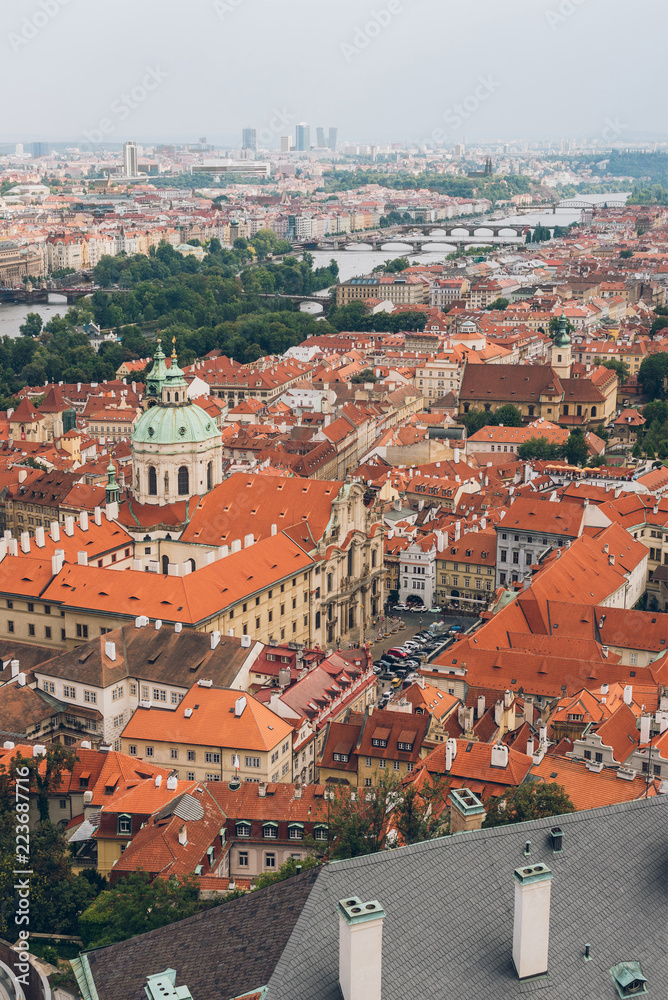 aerial view of prague old town cityscape with rooftops, Charles Bridge and Vltava river
