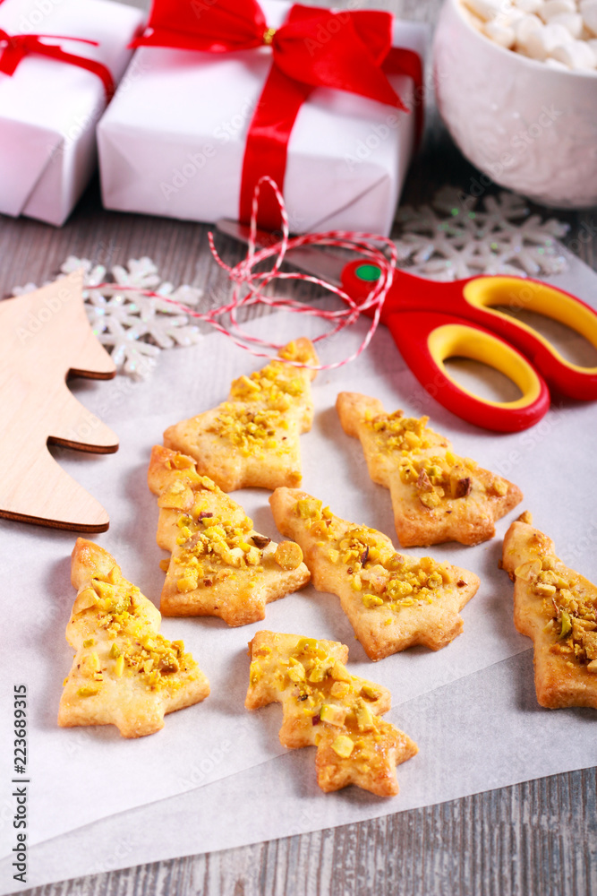 Pistachio topping christmas tree biscuits Pistachio topping christmas tree biscuits