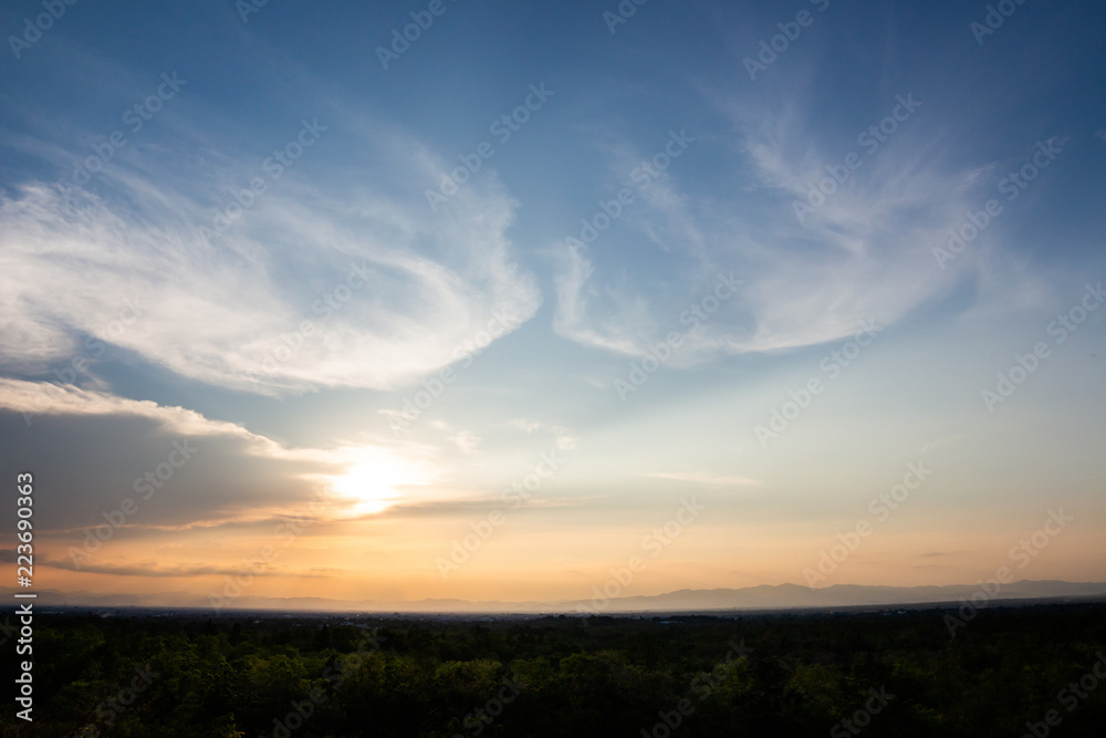 colorful dramatic sky with cloud at sunset.