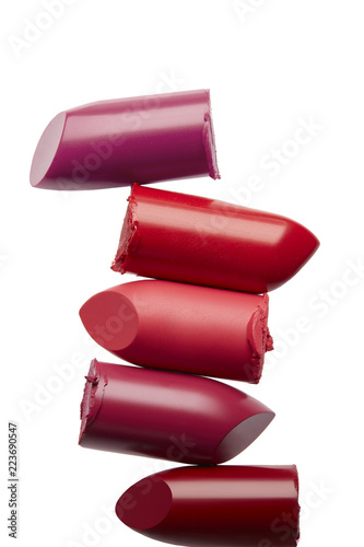 colorful broken lipstick tower isolated on white background