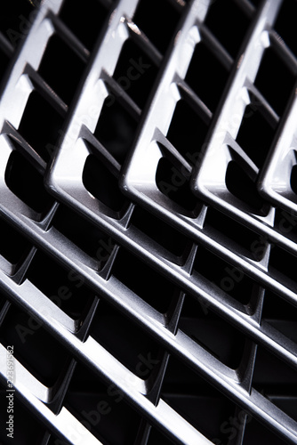 full frame of car metal grating as background