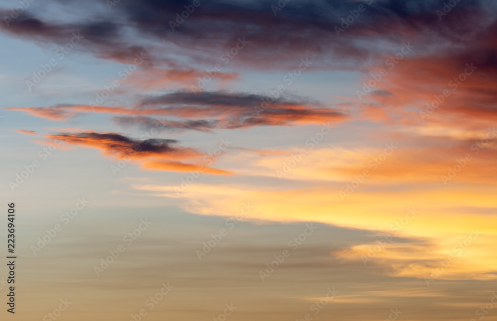 colorful dramatic sky with cloud at sunset..