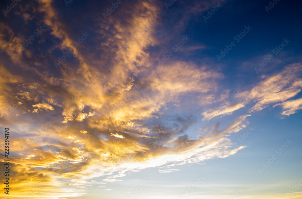 colorful dramatic sky with cloud at sunset..