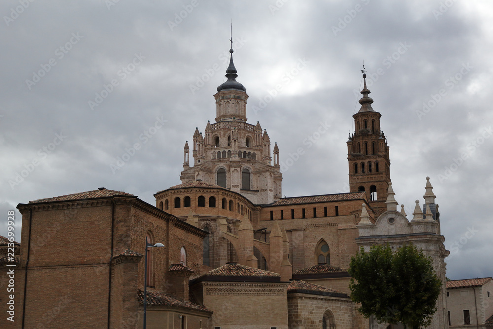 The Nuestra Señora de la Huerta Gothic and mudejar cathedral dome and bell tower in a cloudy, autumn day in Tarrazona, Aragon, Spain