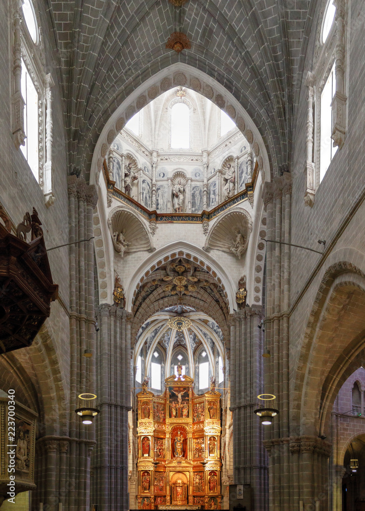 The central nave, the dome and the baroque retable next to the altar of the Nuestra Señora de la Huerta gothic and mudejar cathedral in Tarazona, Aragon, Spain