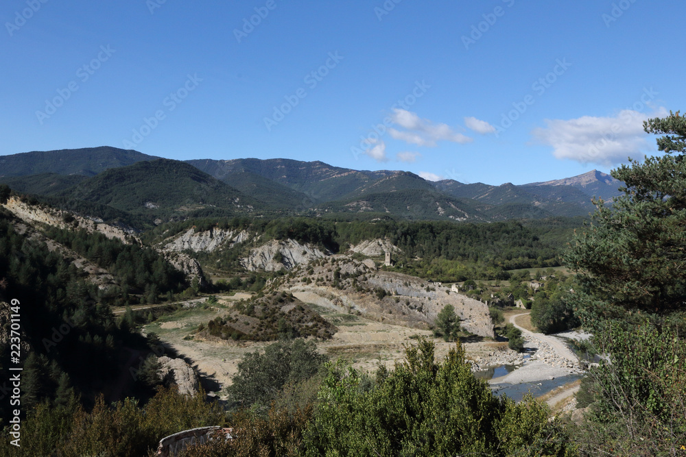 A landscape of Janovas, a ruined village in the Aragonese Pyrenees abandoned during the sixties due to the building of a dam A landscape of Janovas, a ruined village in the Aragonese Pyrenees abandoned during the sixties due to the building of a dam