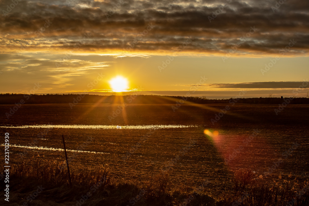 Frozen Christmas Day Sunset over a Farmers Field.