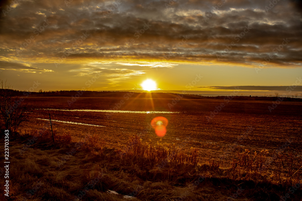 Frozen Christmas Day Sunset over a Farmers Field.