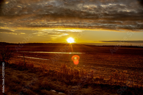 Frozen Christmas Day Sunset over a Farmers Field.
