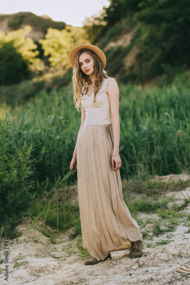 attractive elegant girl in dress and straw hat attractive elegant girl in dress and straw hat