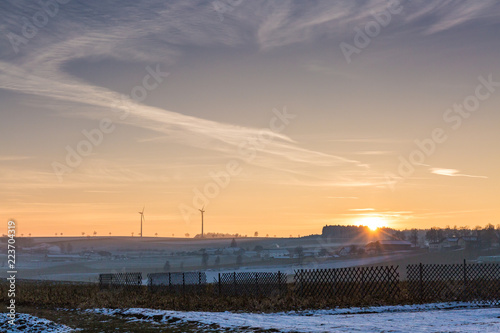 Wind mills at sunset in winter © nobelbunt