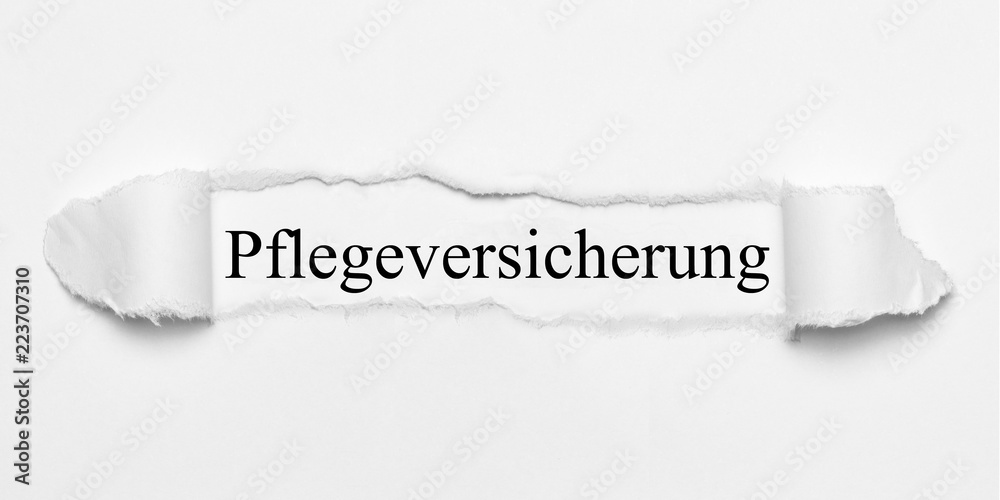 Obraz premium Pflegeversicherung auf weißen gerissenen Papier