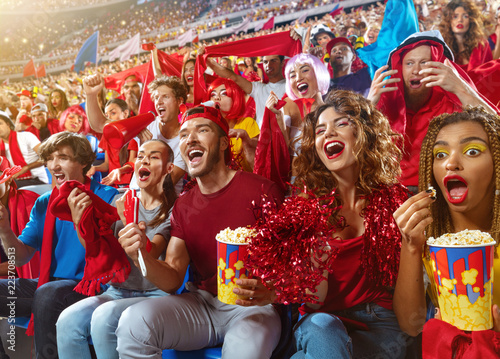 Принти на полотні Young sport supporter happy fans cheering at stadium