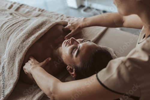 Woman enjoying massage in Spa