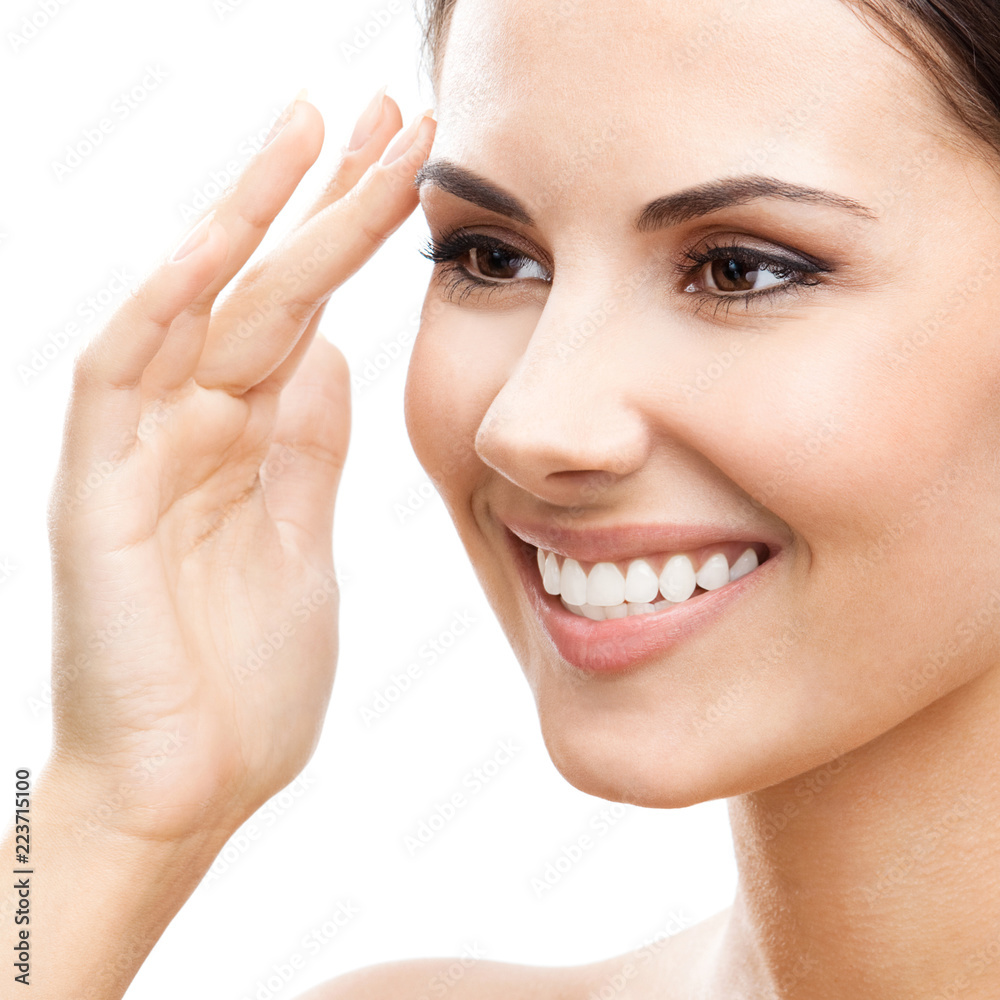 Obraz premium Woman touching skin or applying cream, isolated