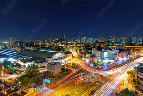 High view of city with traffic car in sunrise time / Good morning Bangkok