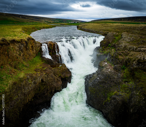 Big green waterfall in Iceland