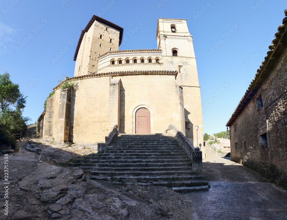A wide angle panorama of the reinforced Saint Martin Church (Iglesia de San Martin) which served also as a fortress in the small rural town of Biel, in Aragon, Spain