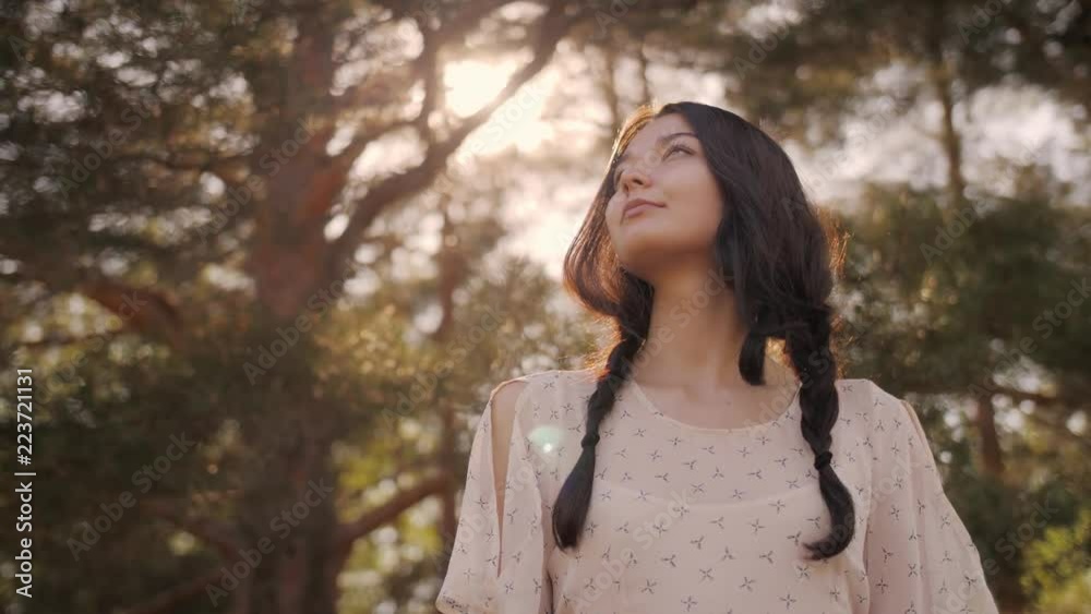 Free happy woman in forest enjoying nature. Natural beauty girl outdoor in freedom enjoyment concept. Mixed race Caucasian Asian girl posing on travel vacation holidays in dress. Slow motion 4k Free happy woman in forest enjoying nature. Natural beauty girl outdoor in freedom enjoyment concept. Mixed race Caucasian Asian girl posing on travel vacation holidays in dress. Slow motion 4k