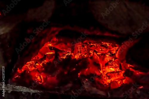 Obraz na płótnie Burning Embers in a Country Wood Stove w salonie