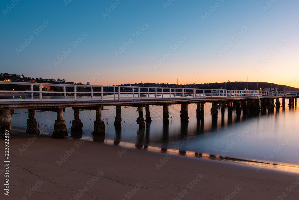 Balmoral Beach pier view at dawn time.