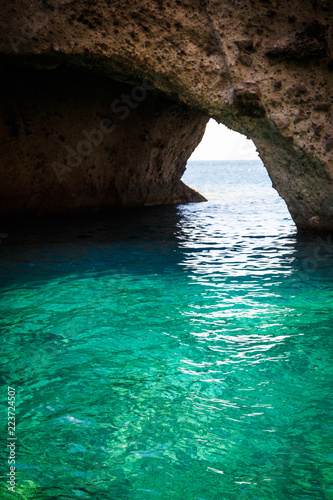 cave and blue water near anti paros greek cycladic island 1