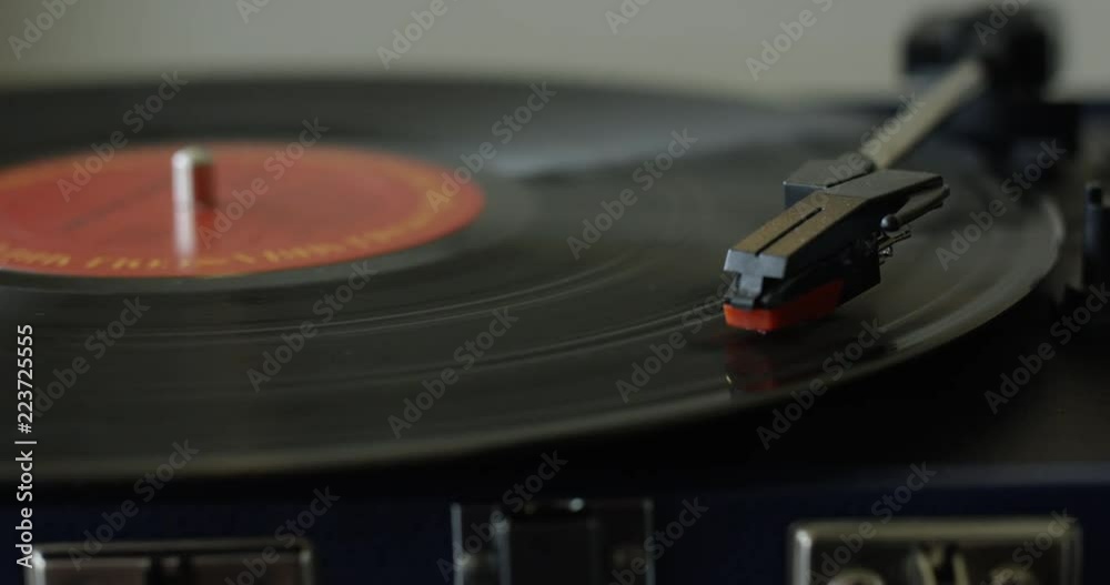 Vinyl Record playing on turntable - close up Vinyl Record playing on turntable - close up
