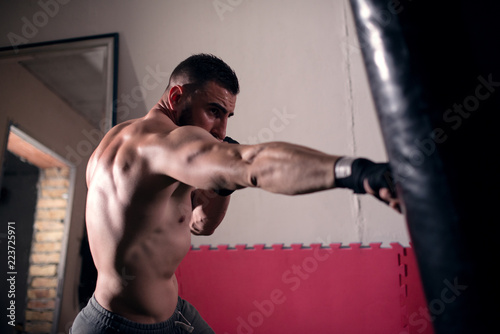Young man boxing workout © Jovan