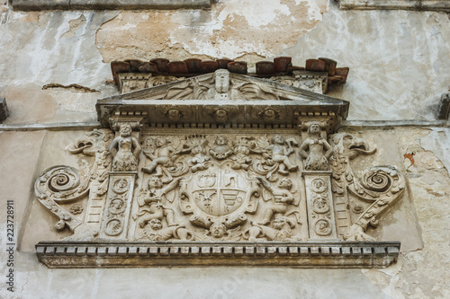 Heraldic composition. Relief. Molding. Olesko castle. Ukraine