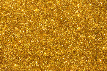 Gold shimmering glitter for texture or background