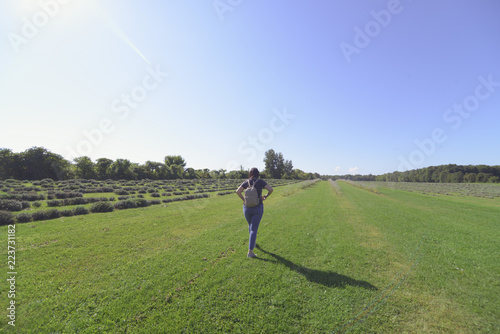 woman walking in a field