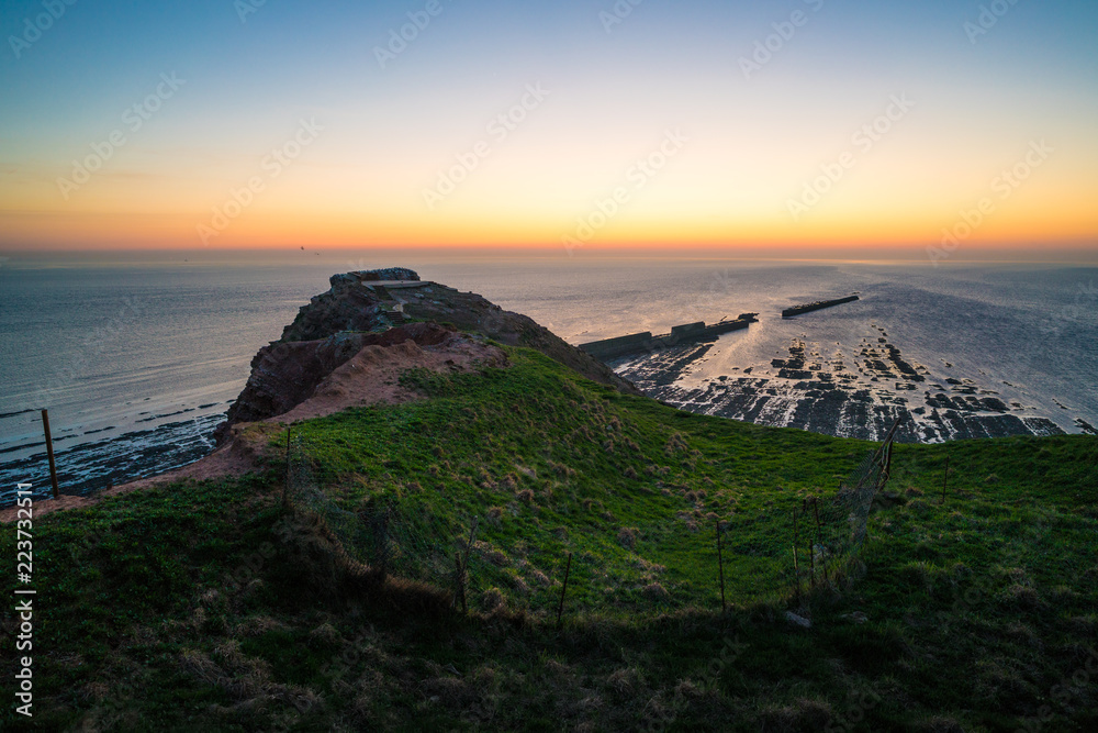View over the northern tip of Heligoland after sunset
