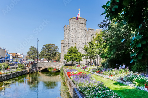 View on the Westgate towers from the wWetsgate gardens park in Canterbury on a sunny day, England, UK photo