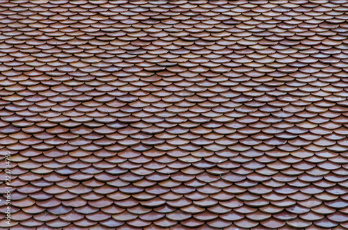 Pattern of tiles on the roof © khampiranon